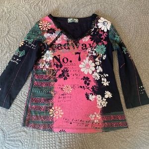 Extra small Vanilla Sugar half shelve shirt.